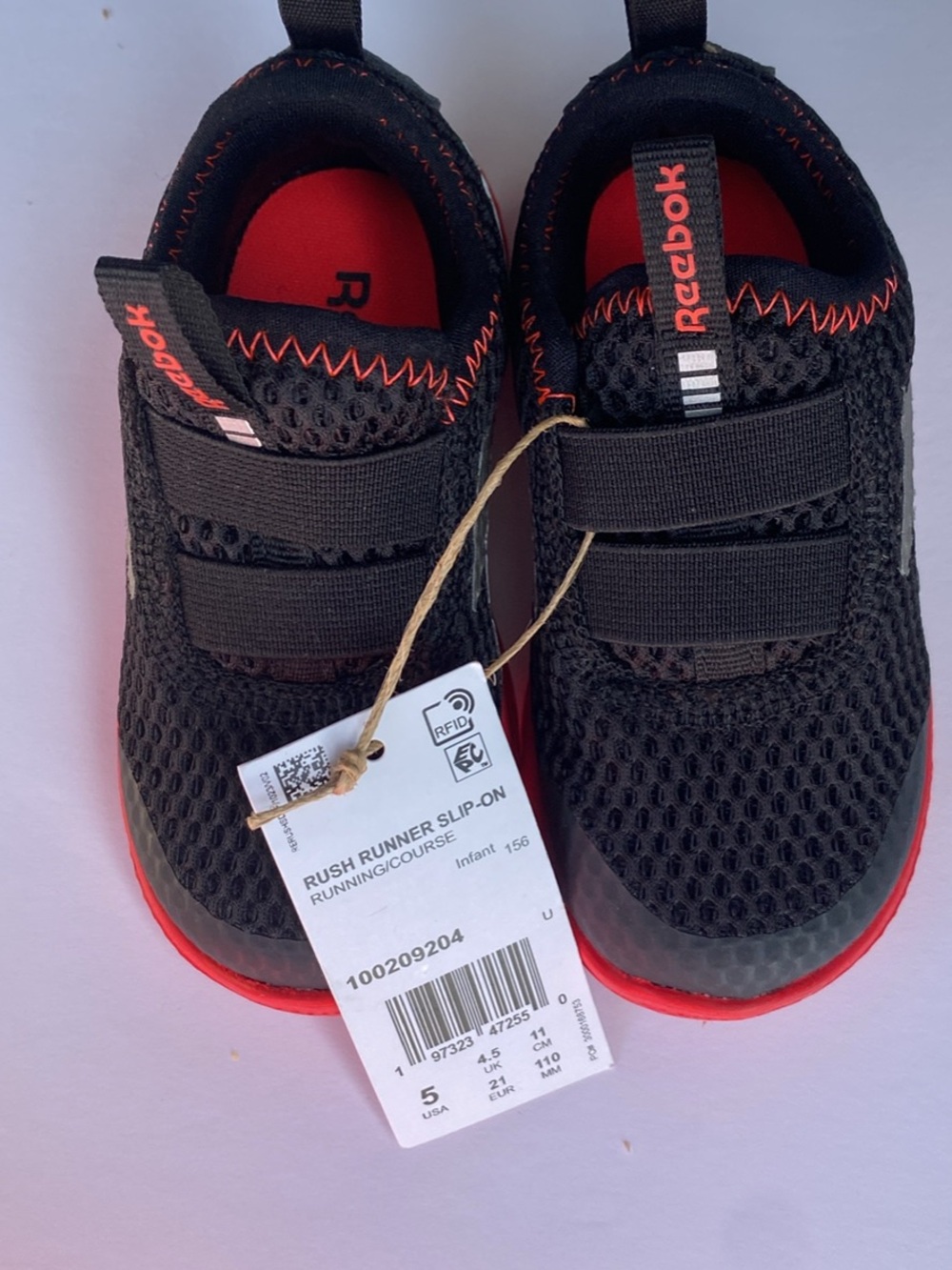 Reebok Kids Black and Red Slip-On Runner Sneakers